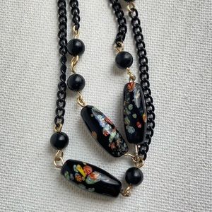 Black glass floral beads along black chain in station style necklace VINTAGE
